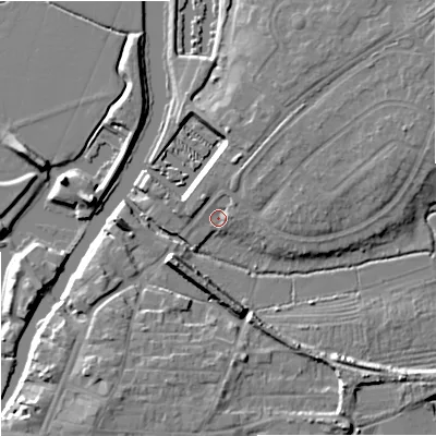 Shaded relief map of the ground around GL205DA, computed from Environment Agency LiDAR. The ground here sits at about 12 m above sea level and falls 9 m across the surrounding 800 m. Surface water reaching this point runs off ground lying to the north-east, 2.0 m higher.