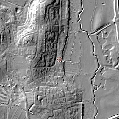 Shaded relief map of the ground around GL205EY, computed from Environment Agency LiDAR. The ground here sits at about 13 m above sea level and falls 12 m across the surrounding 800 m. Surface water reaching this point runs off ground lying to the west-north-west, 9.3 m higher.