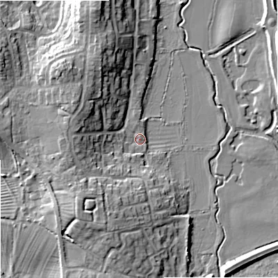 Shaded relief map of the ground around GL205HR, computed from Environment Agency LiDAR. The ground here sits at about 13 m above sea level and falls 12 m across the surrounding 800 m. Surface water reaching this point runs off ground lying to the north-west, 9.6 m higher.