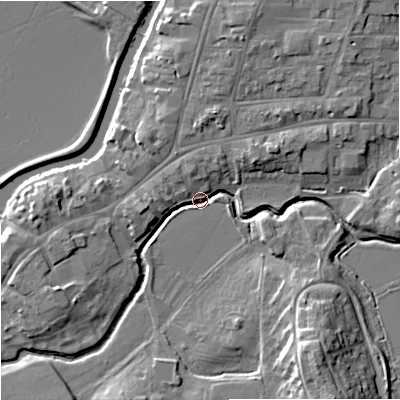 Shaded relief map of the ground around GL205PJ, computed from Environment Agency LiDAR. The ground here sits at about 11 m above sea level and falls 12 m across the surrounding 800 m. Surface water reaching this point runs off ground lying to the south-east, 11.3 m higher.