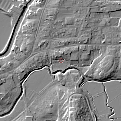 Shaded relief map of the ground around GL205PW, computed from Environment Agency LiDAR. The ground here sits at about 13 m above sea level and falls 12 m across the surrounding 800 m. Surface water reaching this point runs off ground lying to the north, 4.0 m higher.