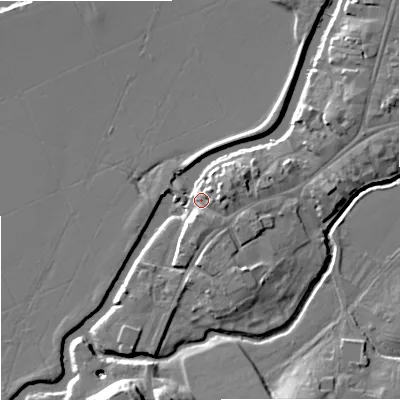 Shaded relief map of the ground around GL205SB, computed from Environment Agency LiDAR. The ground here sits at about 13 m above sea level and falls 13 m across the surrounding 800 m. Surface water reaching this point runs off ground lying to the east, 5.2 m higher.