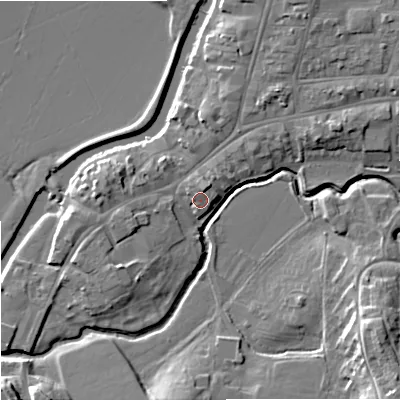 Shaded relief map of the ground around GL205UJ, computed from Environment Agency LiDAR. The ground here sits at about 13 m above sea level and falls 12 m across the surrounding 800 m. Surface water reaching this point runs off ground lying to the north-north-east, 1.8 m higher.