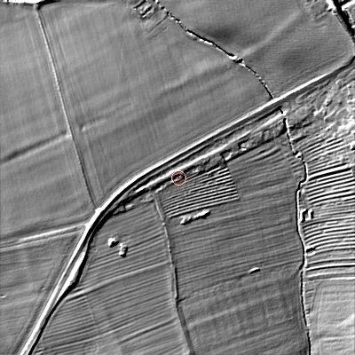 Shaded relief map of the ground around GL207AL, computed from Environment Agency LiDAR. The ground here sits at about 34 m above sea level and falls 11 m across the surrounding 800 m. Surface water reaching this point runs off ground lying to the west-south-west, 2.2 m higher.