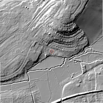 Shaded relief map of the ground around GL208BH, computed from Environment Agency LiDAR. The ground here sits at about 13 m above sea level and falls 21 m across the surrounding 800 m. Surface water reaching this point runs off ground lying to the north, 9.8 m higher.
