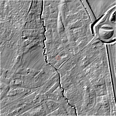 Shaded relief map of the ground around GL20NP, computed from Environment Agency LiDAR. The ground here sits at about 18 m above sea level and falls 9 m across the surrounding 800 m. Surface water reaching this point runs off ground lying to the south, 1.1 m higher.