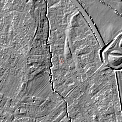 Shaded relief map of the ground around GL20NR, computed from Environment Agency LiDAR. The ground here sits at about 18 m above sea level and falls 9 m across the surrounding 800 m. Surface water reaching this point runs off ground lying to the south-east, 4.4 m higher.