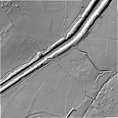 Shaded relief map of the ground around GL24RL, computed from Environment Agency LiDAR. The ground here sits at about 11 m above sea level and falls 11 m across the surrounding 800 m. Surface water reaching this point runs off ground lying to the north-east, 6.3 m higher.