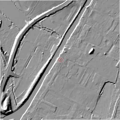 Shaded relief map of the ground around GL25DH, computed from Environment Agency LiDAR. The ground here sits at about 12 m above sea level and falls 13 m across the surrounding 800 m. Surface water reaching this point runs off ground lying to the south-south-west, 2.0 m higher.