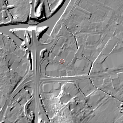 Shaded relief map of the ground around GL25DX, computed from Environment Agency LiDAR. The ground here sits at about 12 m above sea level and falls 14 m across the surrounding 800 m. Surface water reaching this point runs off ground lying to the west-north-west, 3.9 m higher.