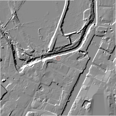 Shaded relief map of the ground around GL25HQ, computed from Environment Agency LiDAR. The ground here sits at about 11 m above sea level and falls 10 m across the surrounding 800 m. Surface water reaching this point runs off ground lying to the west, 7.1 m higher.