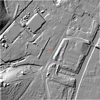 Shaded relief map of the ground around GL25JA, computed from Environment Agency LiDAR. The ground here sits at about 10 m above sea level and falls 19 m across the surrounding 800 m. Surface water reaching this point runs off ground lying to the west, 2.6 m higher.
