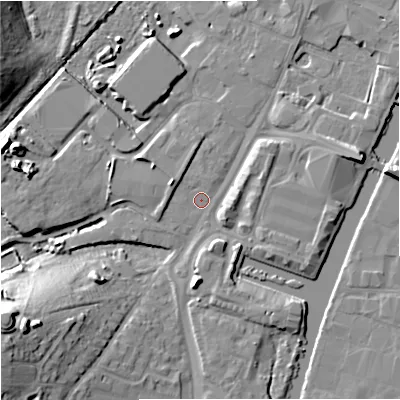 Shaded relief map of the ground around GL25JD, computed from Environment Agency LiDAR. The ground here sits at about 10 m above sea level and falls 17 m across the surrounding 800 m. Surface water reaching this point runs off ground lying to the west-north-west, 2.6 m higher.