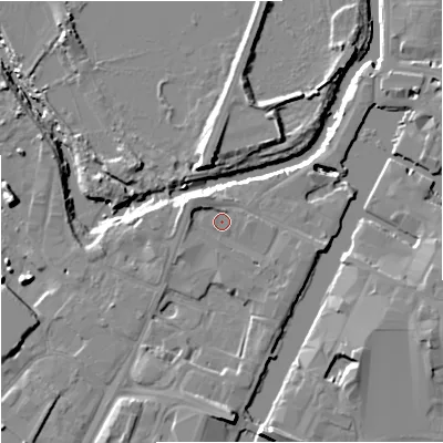 Shaded relief map of the ground around GL25JQ, computed from Environment Agency LiDAR. The ground here sits at about 11 m above sea level and falls 11 m across the surrounding 800 m. Surface water reaching this point runs off ground lying to the north-west, 2.6 m higher.