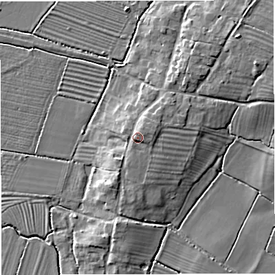 Shaded relief map of the ground around GL27JL, computed from Environment Agency LiDAR. The ground here sits at about 12 m above sea level and falls 8 m across the surrounding 800 m. Surface water reaching this point runs off ground lying to the south-south-east, 1.6 m higher.