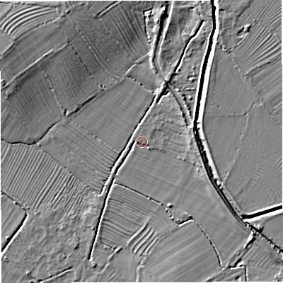 Shaded relief map of the ground around GL27LQ, computed from Environment Agency LiDAR. The ground here sits at about 7 m above sea level and falls 8 m across the surrounding 800 m. Surface water reaching this point runs off ground lying to the north-north-east, 3.7 m higher.