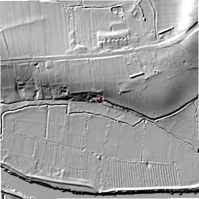 Shaded relief map of the ground around GL28JN, computed from Environment Agency LiDAR. The ground here sits at about 12 m above sea level and falls 18 m across the surrounding 800 m. Surface water reaching this point runs off ground lying to the north, 11.2 m higher.