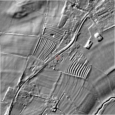 Shaded relief map of the ground around GL29PQ, computed from Environment Agency LiDAR. The ground here sits at about 12 m above sea level and falls 7 m across the surrounding 800 m. Surface water reaching this point runs off ground lying to the north-east, 1.6 m higher.
