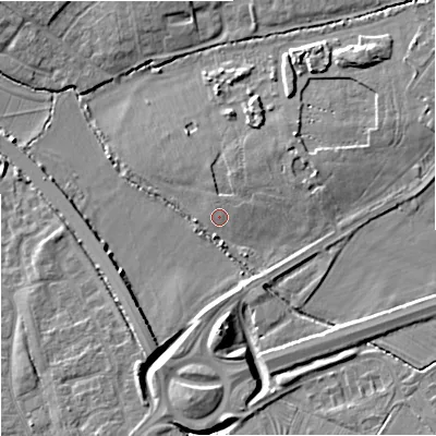 Shaded relief map of the ground around GL31GG, computed from Environment Agency LiDAR. The ground here sits at about 18 m above sea level and falls 8 m across the surrounding 800 m. Surface water reaching this point runs off ground lying to the east-north-east, 1.5 m higher.