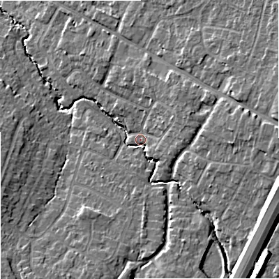 Shaded relief map of the ground around GL33EG, computed from Environment Agency LiDAR. The ground here sits at about 33 m above sea level and falls 16 m across the surrounding 800 m. Surface water reaching this point runs off ground lying to the east-south-east, 13.2 m higher.