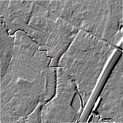 Shaded relief map of the ground around GL33QU, computed from Environment Agency LiDAR. The ground here sits at about 35 m above sea level and falls 19 m across the surrounding 800 m. Surface water reaching this point runs off ground lying to the east-north-east, 7.4 m higher.