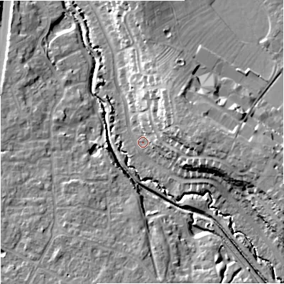 Shaded relief map of the ground around GL40TN, computed from Environment Agency LiDAR. The ground here sits at about 17 m above sea level and falls 18 m across the surrounding 800 m. Surface water reaching this point runs off ground lying to the east-north-east, 11.6 m higher.