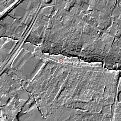 Shaded relief map of the ground around GL43AN, computed from Environment Agency LiDAR. The ground here sits at about 23 m above sea level and falls 12 m across the surrounding 800 m. Surface water reaching this point runs off ground lying to the south-east, 7.6 m higher.