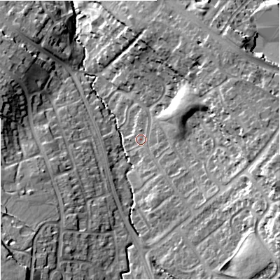 Shaded relief map of the ground around GL45YA, computed from Environment Agency LiDAR. The ground here sits at about 38 m above sea level and falls 24 m across the surrounding 800 m. Surface water reaching this point runs off ground lying to the east-south-east, 17.1 m higher.