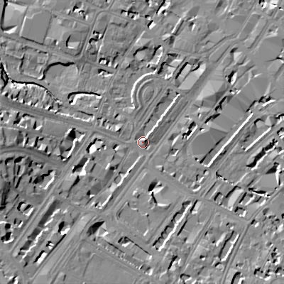 Shaded relief map of the ground around GL501HH, computed from Environment Agency LiDAR. The ground here sits at about 57 m above sea level and falls 18 m across the surrounding 800 m. Surface water reaching this point runs off ground lying to the south-west, 14.6 m higher.