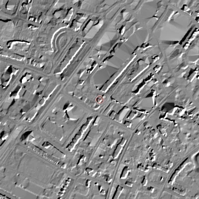 Shaded relief map of the ground around GL501HT, computed from Environment Agency LiDAR. The ground here sits at about 57 m above sea level and falls 15 m across the surrounding 800 m. Surface water reaching this point runs off ground lying to the east-north-east, 9.2 m higher.