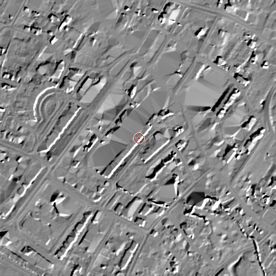 Shaded relief map of the ground around GL501HX, computed from Environment Agency LiDAR. The ground here sits at about 57 m above sea level and falls 13 m across the surrounding 800 m. Surface water reaching this point runs off ground lying to the east-north-east, 4.9 m higher.