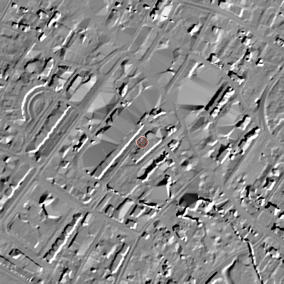 Shaded relief map of the ground around GL501JJ, computed from Environment Agency LiDAR. The ground here sits at about 59 m above sea level and falls 12 m across the surrounding 800 m. Surface water reaching this point runs off ground lying to the east-north-east, 3.2 m higher.