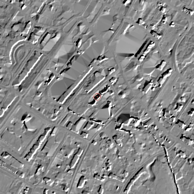 Shaded relief map of the ground around GL501JN, computed from Environment Agency LiDAR. The ground here sits at about 58 m above sea level and falls 12 m across the surrounding 800 m. Surface water reaching this point runs off ground lying to the north-east, 3.5 m higher.