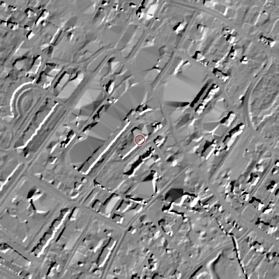 Shaded relief map of the ground around GL501JS, computed from Environment Agency LiDAR. The ground here sits at about 58 m above sea level and falls 12 m across the surrounding 800 m. Surface water reaching this point runs off ground lying to the east, 7.9 m higher.