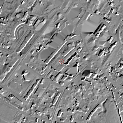 Shaded relief map of the ground around GL501JU, computed from Environment Agency LiDAR. The ground here sits at about 58 m above sea level and falls 12 m across the surrounding 800 m. Surface water reaching this point runs off ground lying to the east, 8.1 m higher.