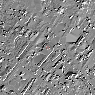 Shaded relief map of the ground around GL501JZ, computed from Environment Agency LiDAR. The ground here sits at about 57 m above sea level and falls 13 m across the surrounding 800 m. Surface water reaching this point runs off ground lying to the north-north-east, 3.9 m higher.
