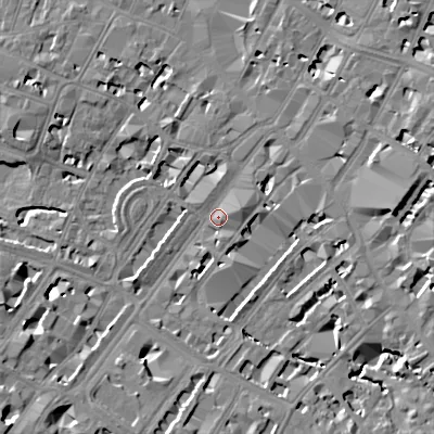 Shaded relief map of the ground around GL501LY, computed from Environment Agency LiDAR. The ground here sits at about 58 m above sea level and falls 12 m across the surrounding 800 m. Surface water reaching this point runs off ground lying to the east, 8.0 m higher.