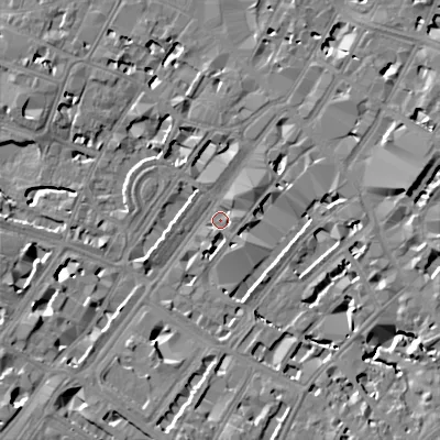 Shaded relief map of the ground around GL501NA, computed from Environment Agency LiDAR. The ground here sits at about 58 m above sea level and falls 12 m across the surrounding 800 m. Surface water reaching this point runs off ground lying to the east-north-east, 3.7 m higher.
