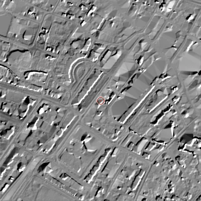 Shaded relief map of the ground around GL501NB, computed from Environment Agency LiDAR. The ground here sits at about 57 m above sea level and falls 14 m across the surrounding 800 m. Surface water reaching this point runs off ground lying to the east-north-east, 8.4 m higher.