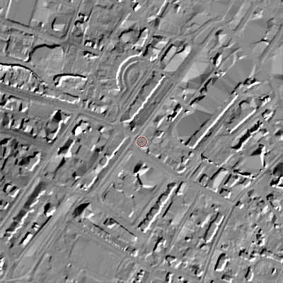 Shaded relief map of the ground around GL501NL, computed from Environment Agency LiDAR. The ground here sits at about 57 m above sea level and falls 16 m across the surrounding 800 m. Surface water reaching this point runs off ground lying to the south-west, 13.9 m higher.