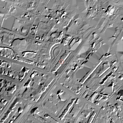 Shaded relief map of the ground around GL501PJ, computed from Environment Agency LiDAR. The ground here sits at about 56 m above sea level and falls 15 m across the surrounding 800 m. Surface water reaching this point runs off ground lying to the south-south-west, 3.0 m higher.