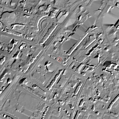Shaded relief map of the ground around GL501QB, computed from Environment Agency LiDAR. The ground here sits at about 57 m above sea level and falls 16 m across the surrounding 800 m. Surface water reaching this point runs off ground lying to the south-south-east, 8.7 m higher.