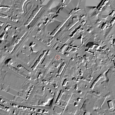 Shaded relief map of the ground around GL501XP, computed from Environment Agency LiDAR. The ground here sits at about 59 m above sea level and falls 16 m across the surrounding 800 m. Surface water reaching this point runs off ground lying to the south-south-west, 11.7 m higher.
