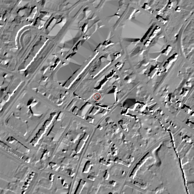 Shaded relief map of the ground around GL501XZ, computed from Environment Agency LiDAR. The ground here sits at about 59 m above sea level and falls 13 m across the surrounding 800 m. Surface water reaching this point runs off ground lying to the east-south-east, 8.9 m higher.