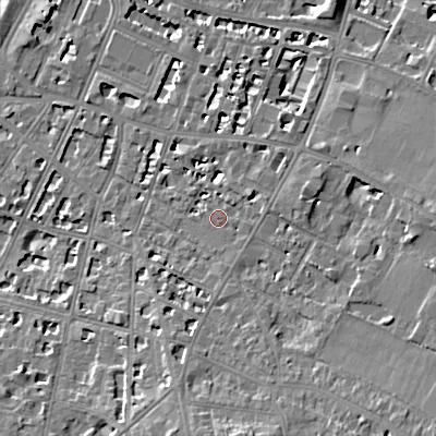 Shaded relief map of the ground around GL502AL, computed from Environment Agency LiDAR. The ground here sits at about 69 m above sea level and falls 14 m across the surrounding 800 m. Surface water reaching this point runs off ground lying to the north-east, 2.7 m higher.