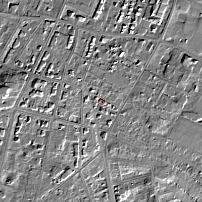 Shaded relief map of the ground around GL502BP, computed from Environment Agency LiDAR. The ground here sits at about 68 m above sea level and falls 16 m across the surrounding 800 m. Surface water reaching this point runs off ground lying to the south-east, 2.8 m higher.