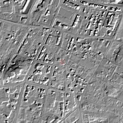 Shaded relief map of the ground around GL502EF, computed from Environment Agency LiDAR. The ground here sits at about 67 m above sea level and falls 13 m across the surrounding 800 m. Surface water reaching this point runs off ground lying to the south-east, 1.4 m higher.
