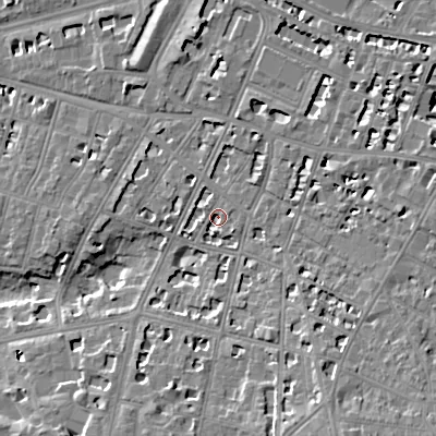 Shaded relief map of the ground around GL502EL, computed from Environment Agency LiDAR. The ground here sits at about 66 m above sea level and falls 13 m across the surrounding 800 m. Surface water reaching this point runs off ground lying to the south-east, 2.5 m higher.