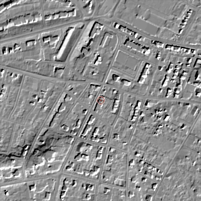 Shaded relief map of the ground around GL502QR, computed from Environment Agency LiDAR. The ground here sits at about 67 m above sea level and falls 11 m across the surrounding 800 m. Surface water reaching this point runs off ground lying to the north-east, 1.9 m higher.