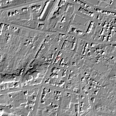Shaded relief map of the ground around GL502QT, computed from Environment Agency LiDAR. The ground here sits at about 66 m above sea level and falls 13 m across the surrounding 800 m. Surface water reaching this point runs off ground lying to the east, 5.7 m higher.